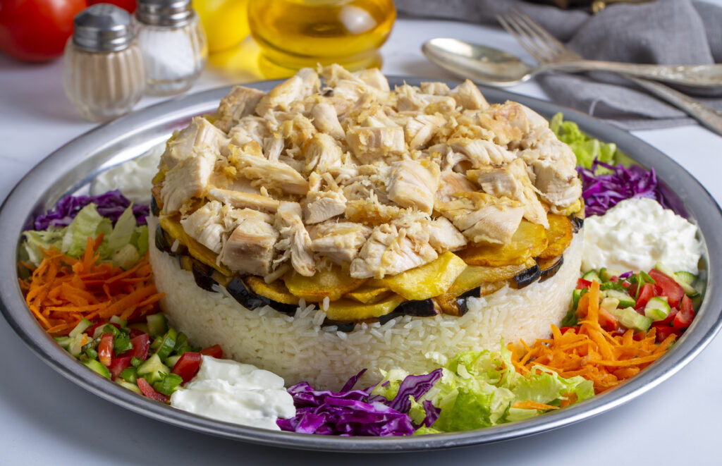 Middle Eastern food culture, Turkish cuisine; type of pilaf, pilaf with chicken and vegetables, Turkish name; Maklube, tavuklu maklube